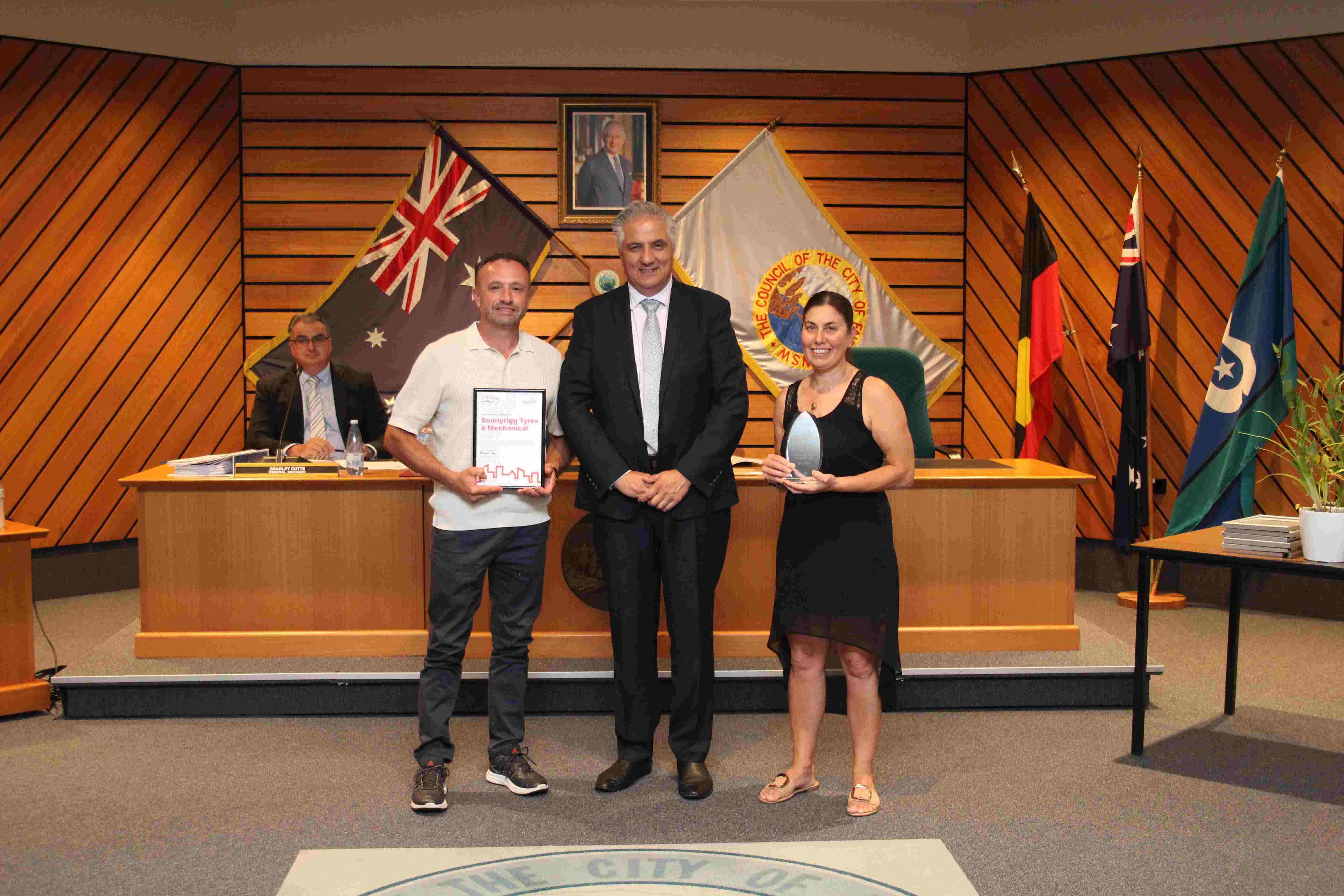 Mayor Frank Carbone with Simon and Therese Grima from Bonnyrigg Tyres and Mechanical in Bonnyrigg. Recipients of the Lifetime Business Award received on 22 October 2024.