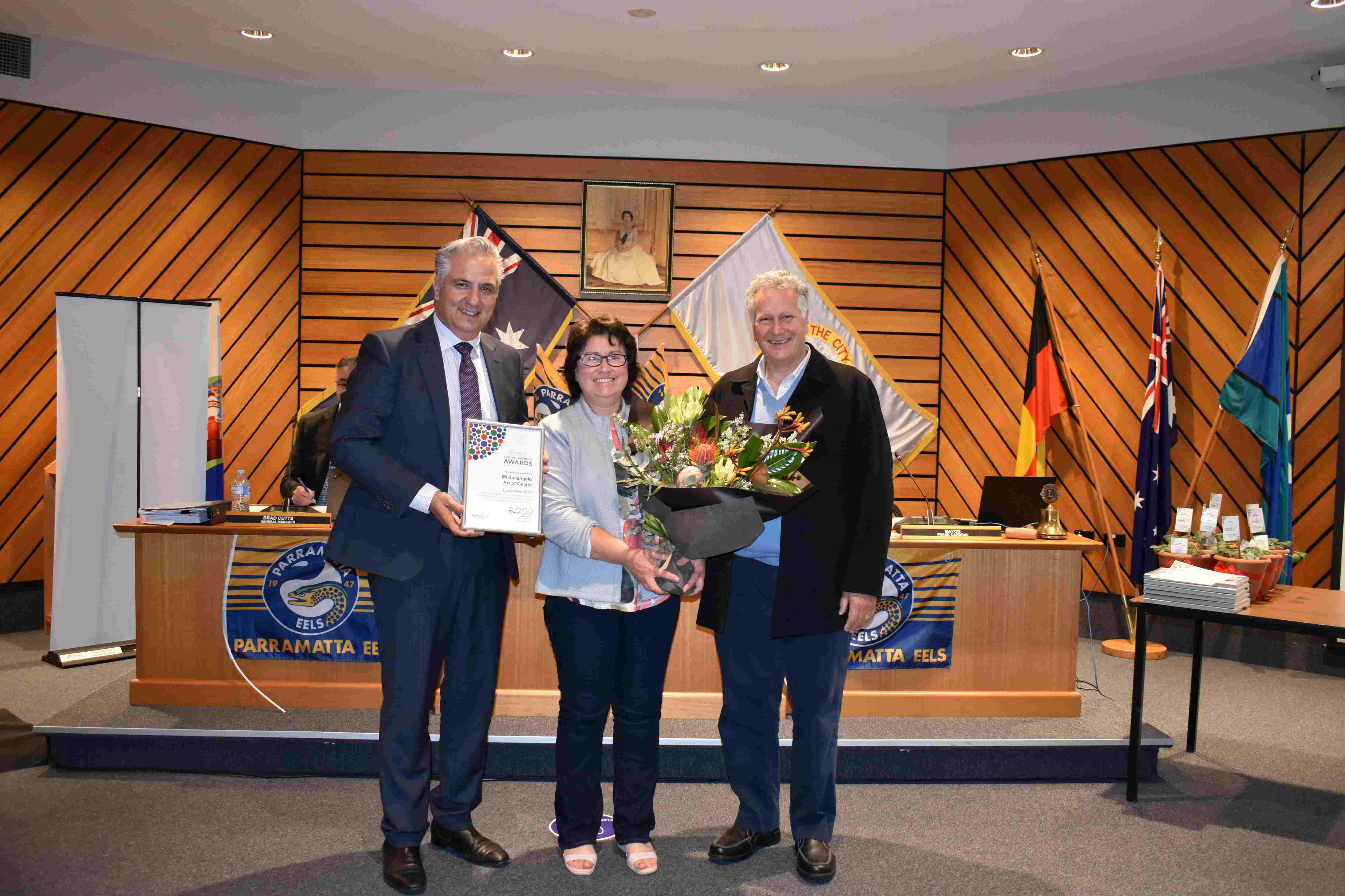 Group photo of Mayor Frank Carbone, Martino and France Piccolo from Michelangelo Art of Gelato receiving the Fairfield City Lifetime Business Award on 27 September 2022.